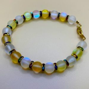 Simple, iridescent, clear and yellow bead bracelet